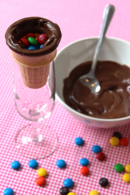 Ice Cream Cone Dipped in Chocolate and Filled With Candy